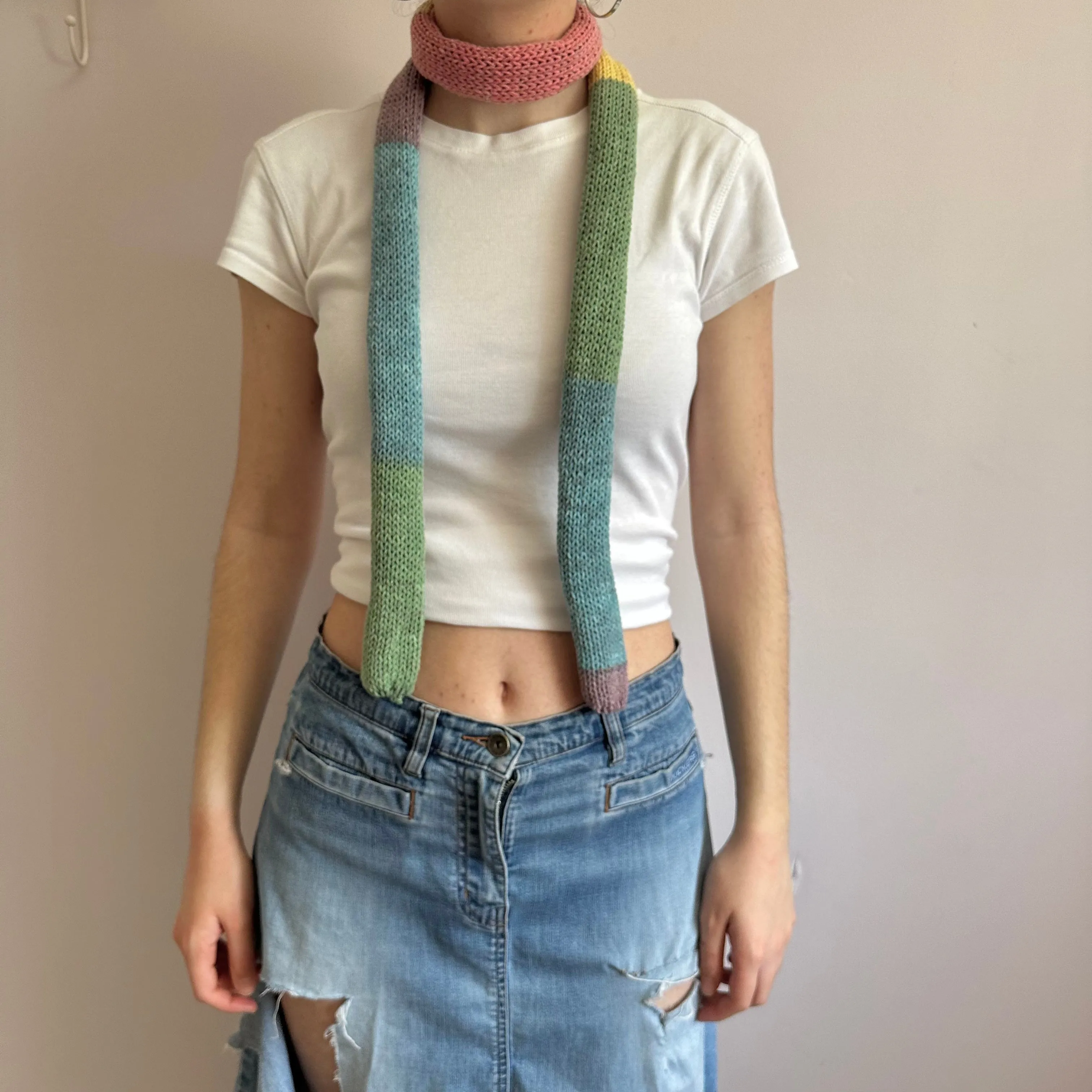 Handmade knitted colour block skinny scarf in dusky rainbow
