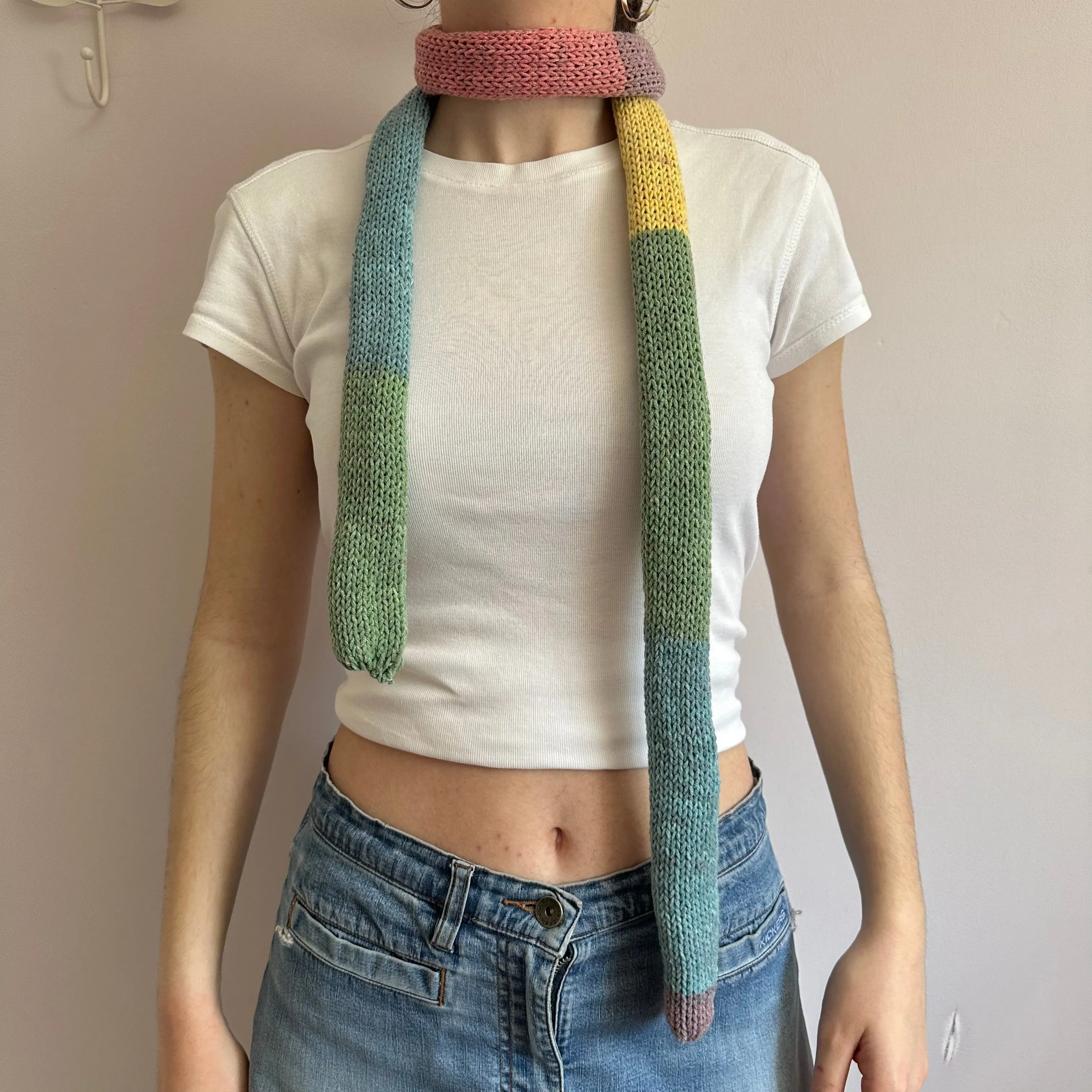 Handmade knitted colour block skinny scarf in dusky rainbow